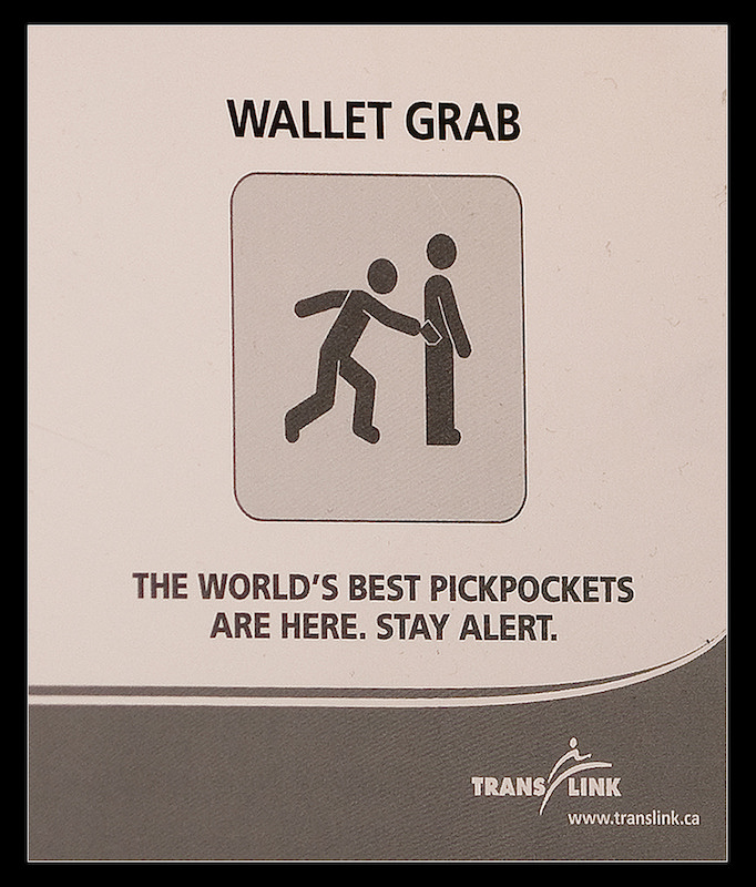 wallet-grab-stay-alert-sign