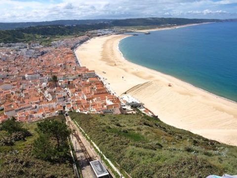 You'll love Nazaré Portugal where tradition and tourism coexist