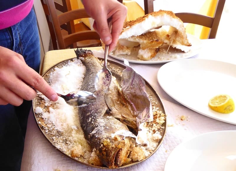 peeling-salt-crusted-wild-bream-Arzella-restaurant-Gozo-Malta